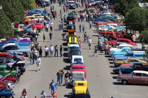 all sorts of cars and trucks lining the street